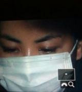 王菲离婚后戴口罩抵首都机场 面容憔悴